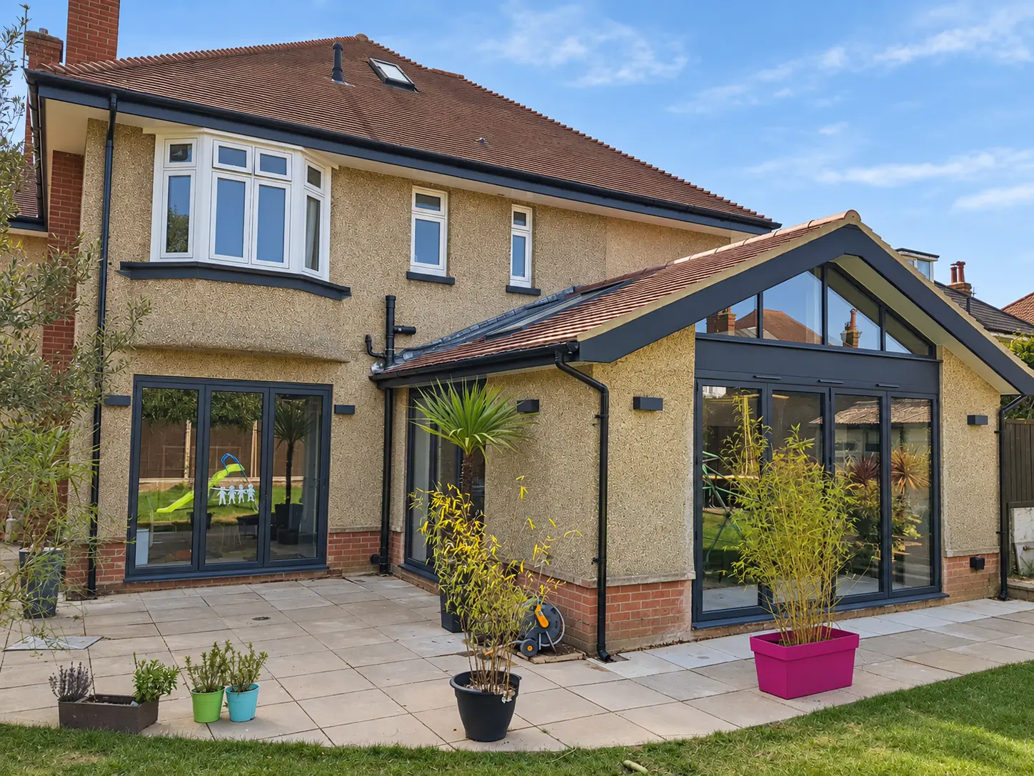 Completed gable-ended extension and patio